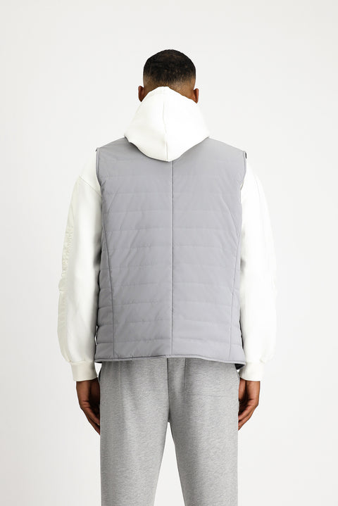 Orta Gri Slim Fit Dar Kesim Dik Yaka Çıtçıtlı Cepli Spor Kapitone Yelek