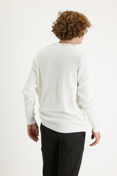 Off-white crew neck slim fit patterned cotton knit sweater.