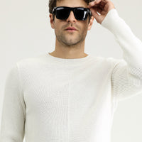 Off-white crew neck slim fit patterned cotton knit sweater.