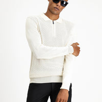 Off-white polo shirt, regular fit, zippered, patterned cotton knit sweater.
