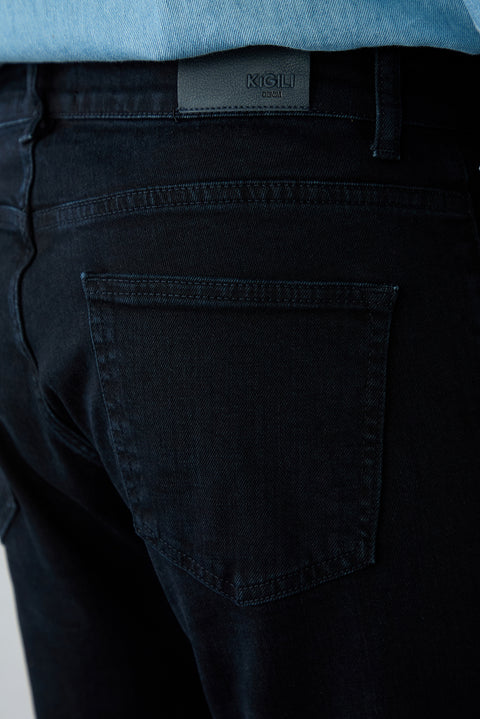 694 Tapered Fit Cotton/Elastane Denim Trousers