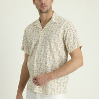 Off-white short-sleeved relaxed fit printed sports shirt.
