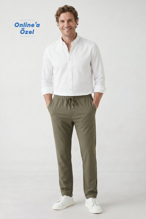 Orta Haki Regular Fit Standart Kesim Yandan Cep Beli Lastikli İpli Jogger Pantolon
